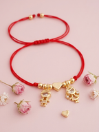 Pulsera Tejida Acero Dorado con Dije Niño y Corazón Regulable