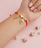 Pulsera Tejida Acero Dorado con Dije Niño y Corazón Regulable