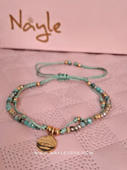Pulsera Tejida Acero Dorado con Dije Frase Grabada Regulable